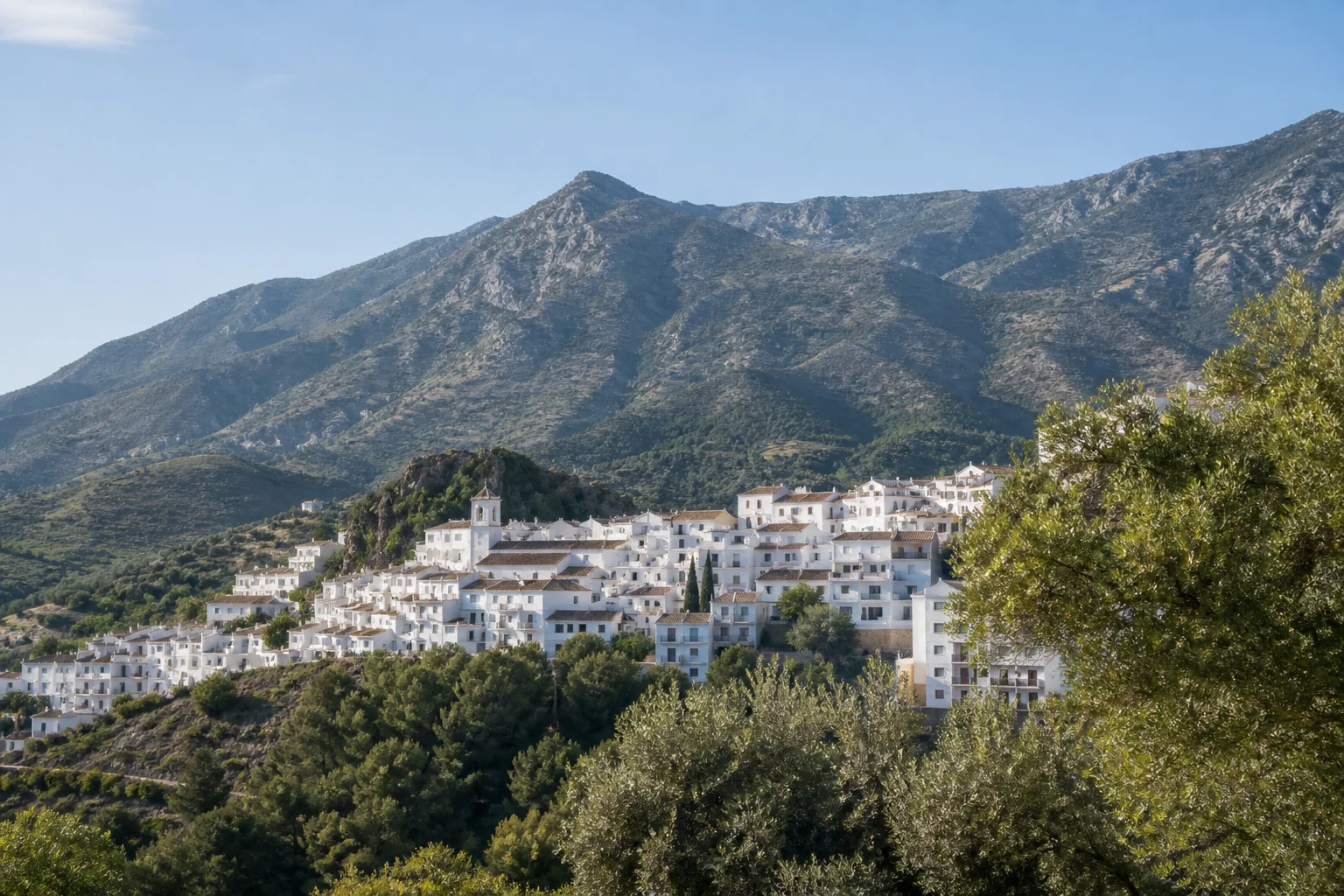 Illustrated whitewashed Andalusian hillside village below Sierra Blanca mountains