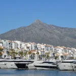 "Unforgettable Marbella: A Nostalgic Journey of Gastronomic Delights and Luxurious Mega Yachts - puerto banus pixabay - Transportation and Travel - Sustainable Travel