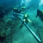 Unearthed Secrets of the Sea: 18th Century Spanish Military Shipwreck Discovered Near Spain's Marbella - technicians from the center for underwater archaeology are analyzing the remains of a sunken ship off the coast of a beach in marbella credit junta - Local Events and Festivities - Homelessness Crisis