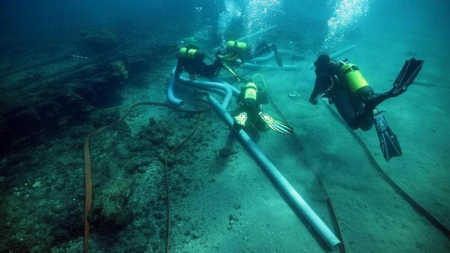 Unearthed Secrets of the Sea: 18th Century Spanish Military Shipwreck Discovered Near Spain's Marbella - technicians from the center for underwater archaeology are analyzing the remains of a sunken ship off the coast of a beach in marbella credit junta - Cultural and Historical Insights -