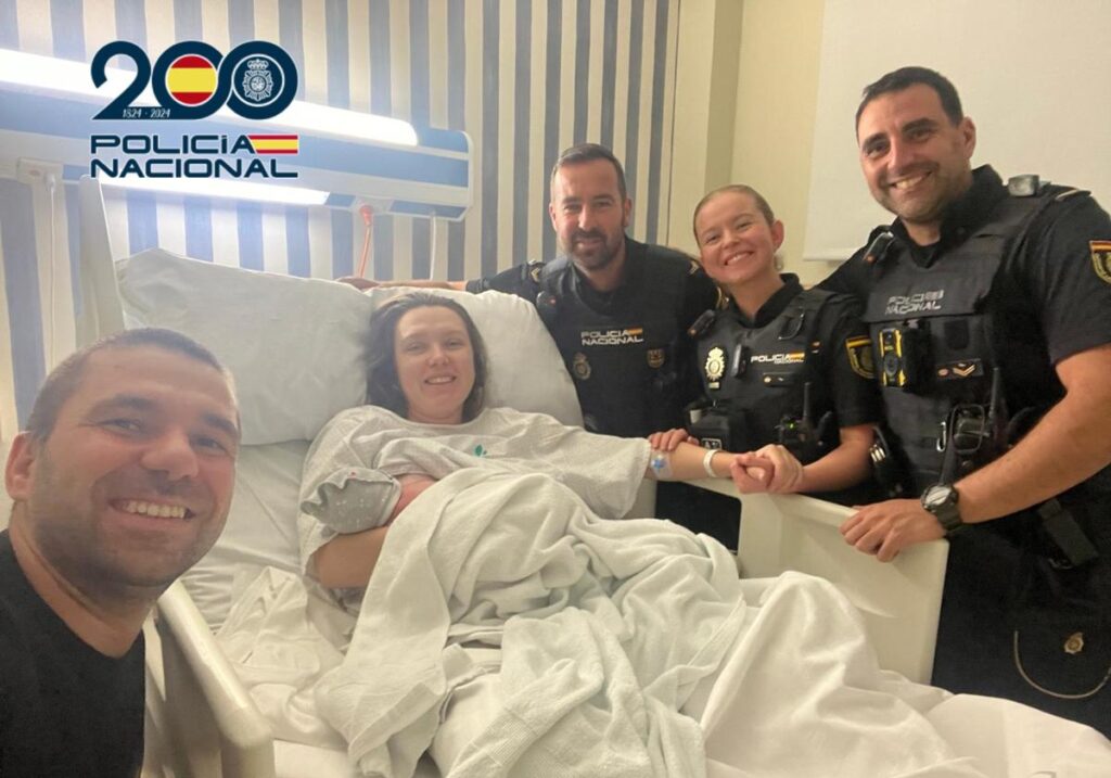 Police officers assist early morning birth on Marbella street