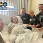 Police officers assist early morning birth on Marbella street