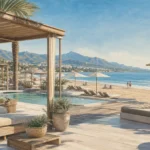 Marbella beach club with shaded lounges, a pool and the sea