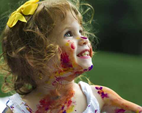 Children and families enjoying an outdoor community event